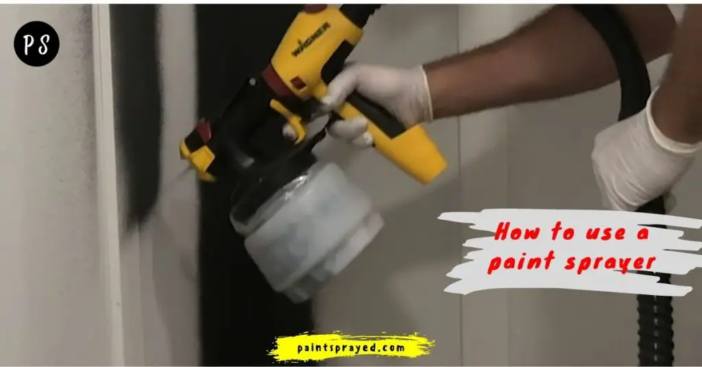 painting the surface with paint sprayer