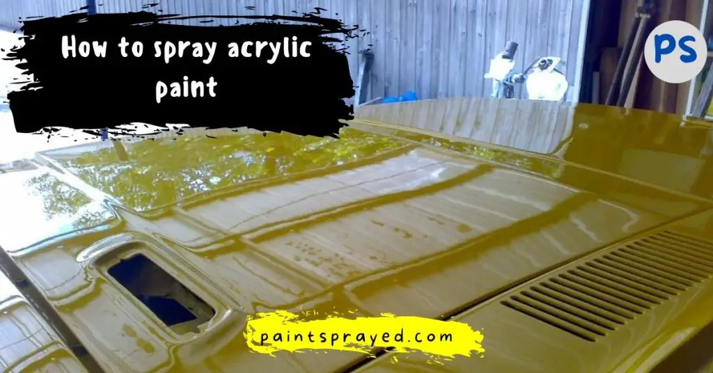 spraying acrylic paint with spray gun