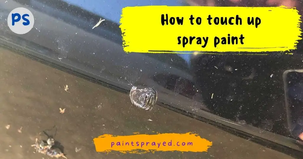 touching up spray paint on car