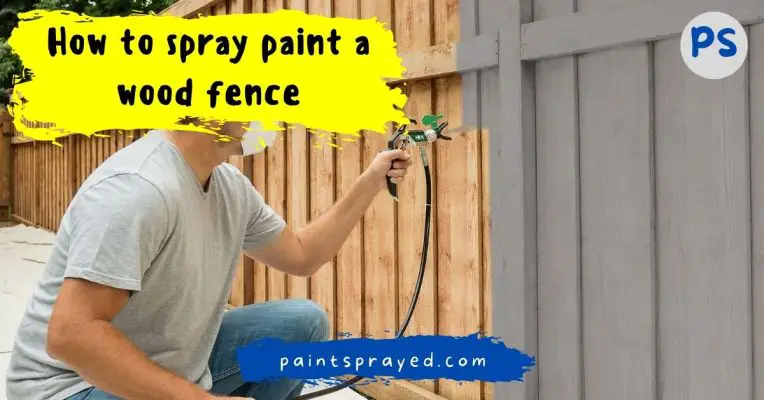 spray painting wooden fence